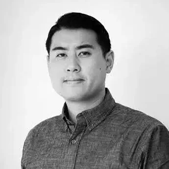 Norm Li – Founder of Norm Li Visualization Studio Black and white portrait of Norm Li, Founder of architectural visualization studio Norm Li.
